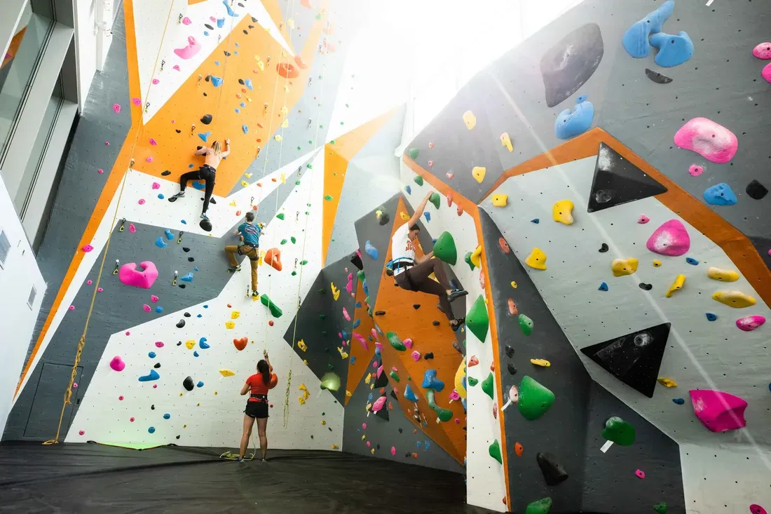 Student rock climbing at the The Barnes Center.